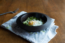 Load image into Gallery viewer, Borough Furnace cast iron cazuela bowls in use as individual serving vessels at the table