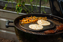 Load image into Gallery viewer, Borough Furnace 15-inch cast iron pizza griddle on a gas grill, 17.5 lbs of thermal mass for perfect home pizza and outdoor use
