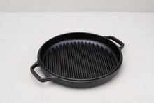 Load image into Gallery viewer, A 12" Borough Furnace cast iron Grill Pan on a neutral background.
